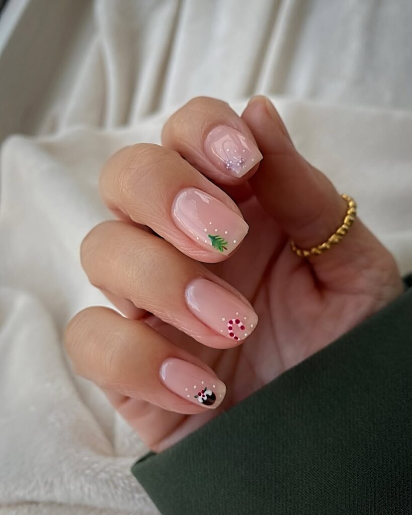 Minimal nude christmas nails with ornaments